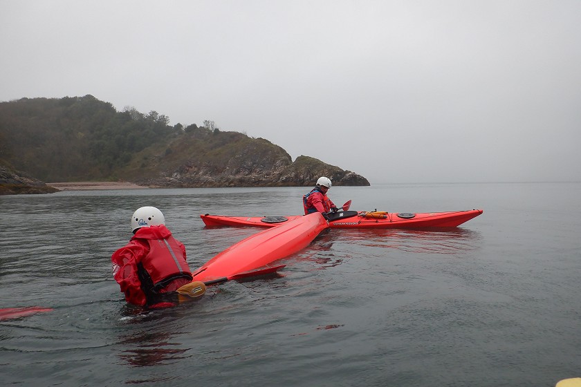 A two-person sea kayak rescue
